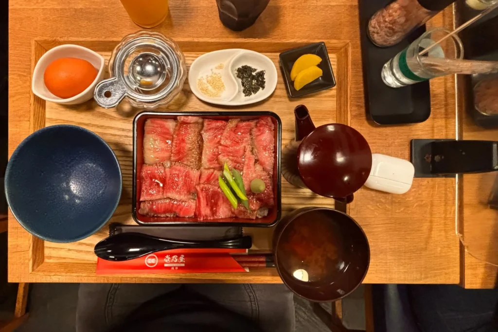 Premium wagyu beef rare steak over rice served at Kuroge Wagyu Ichinoya in Asakusa.